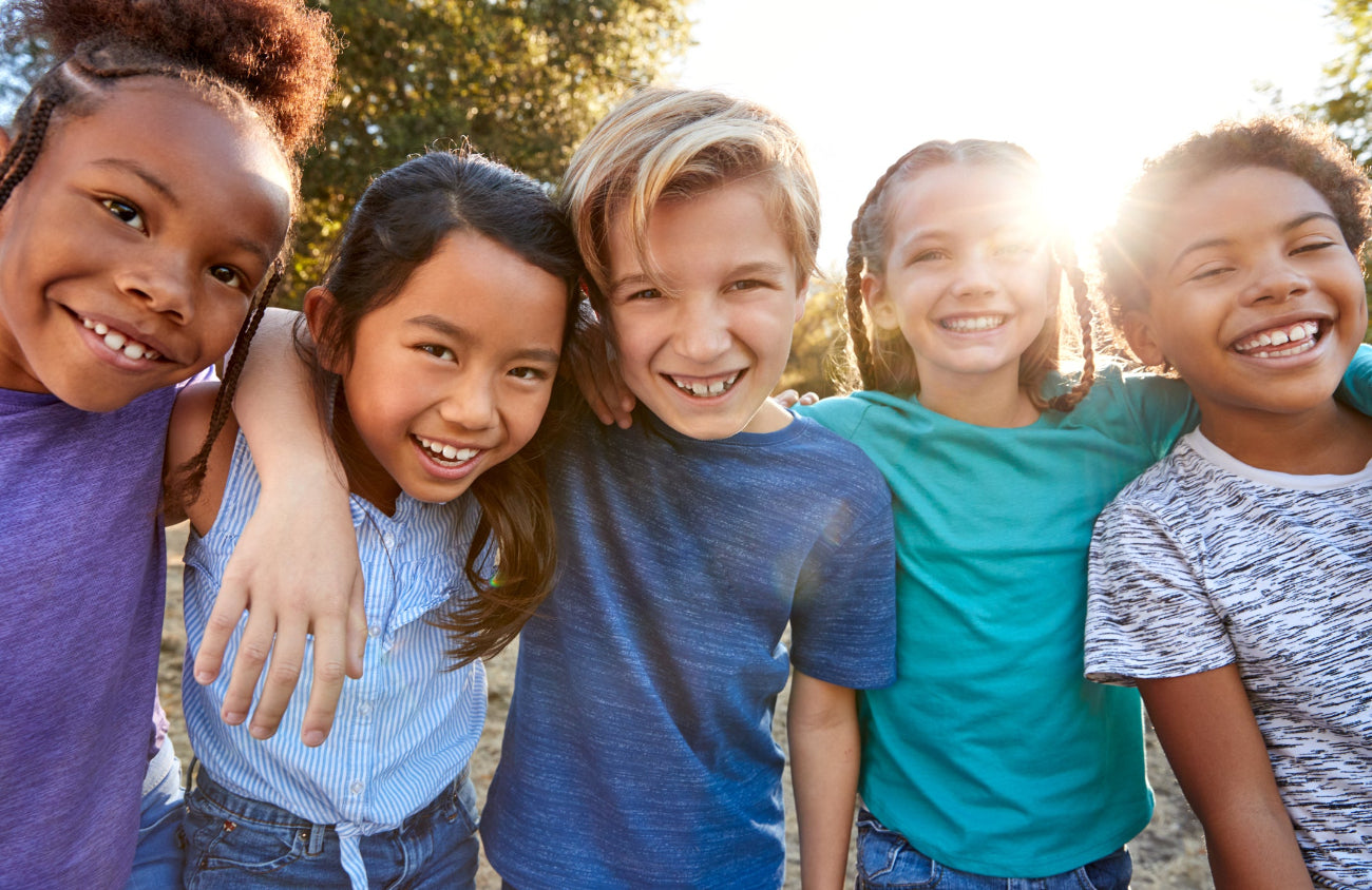 Heartwarming picture of children smiling.